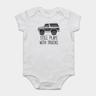 Still plays with trucks Cartoon Muticolor and Black Baby Bodysuit